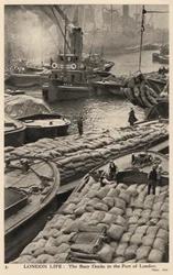 Boats and barges in the busy docks of the port of London