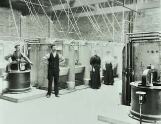 Boundary Street: Interior of Laundry Room, People Working with Machinery, London, 1897