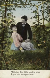 With her dear little hand in mine, I gaze into her eyes divine