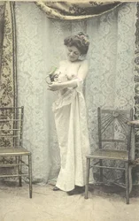 Woman Holding a Toby Jug