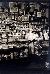 Woman shopkeeper in a tobacconist
