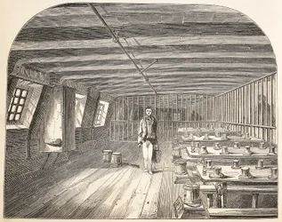 A ward on board the Defence hulk arranged for the return of the convicts to dinner, illustration from The Criminal Prisons of London and Scenes from Prison Life by Henry Mayhew and John Binny, pub. 18
