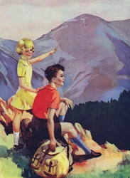 Boy and girl hiking in the mountains