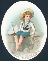 Boy in Sailor Suit with toy yacht
