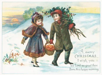 Couple carrying basket of fruit and holly