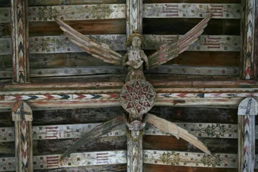 View of one of the carved wooden angels in the nave