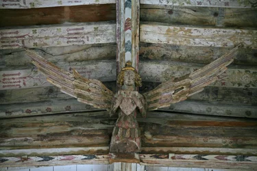 View of one of the carved wooden angels in the nave