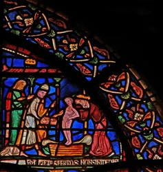 Miracle Window depicting the infant Geoffrey of Winchester making an offering at the tomb of St. Thomas (detail)