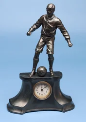 Footballer, part of a clock set