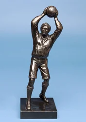 Footballer, part of a clock set