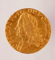 Golden English Guinea, Reign of King George II (1714-1760) 18th Century. Diam. 2.5 cm Naples, Museo Archeologico