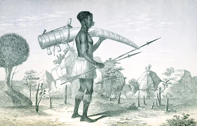 Native carrying a decorated ivory elephant tusk, from The Lake Regions of Central Africa, by Richard F. Burton, 1860