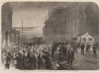 The workmen leaving the grounds