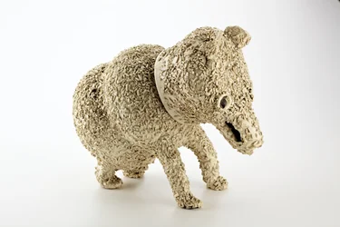 Staffordshire jug in the form of a muzzled bear, 1740