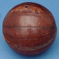 String dispenser in the shape of a football (leather)