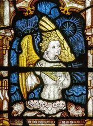 The East window depicting a musician angel