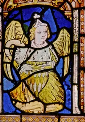 The East window depicting a musician angel with cornamuse