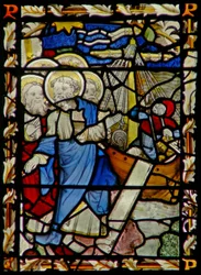 The east window depicting St Peter embarks on a boat with other Apostles