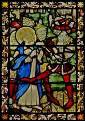 The east window depicting St Peter with the Emperor Nero