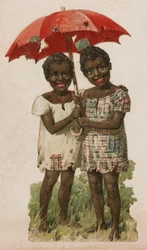 Two poor black children sheltering beneath a tattered umbrella