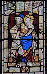 Window Ew depicting St Anne, Joachim, the Virgin Mary and the Christ Child