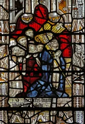 Window depicting St Martin kneels at an altar