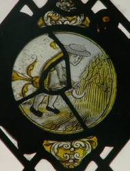 Window depicting the Labours of the Months: August