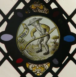 Window depicting the Labours of the Months: July