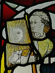 Window S5 depicting an Angel with a Flag with the Sun and a Face