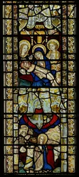 Window depicting Pieta and the Pentecost