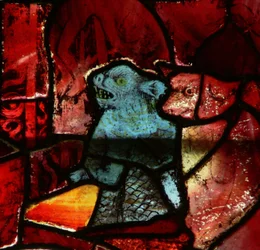 Window depicting two devils