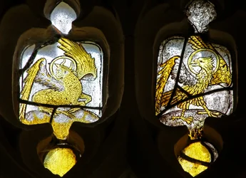 Window depicting Evangelists symbols - St Luke