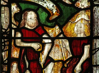 Window 1 depicting Adam delves while Eve spins