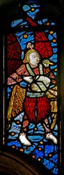 Window depicting a musician angel with pipe and tabor