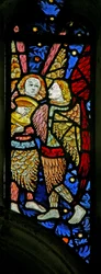 Window depicting musician angels, one with a lute