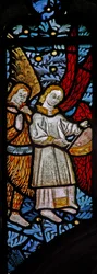 Window depicting musician angels with pipe and tabor