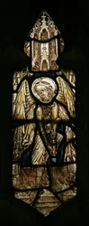 Window depicting a musician angel with a harp