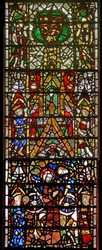 Window w42 depicting St Catherine being tortured: above is a royal coat of arms