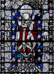 Window depicting St Nicholas; border with figures