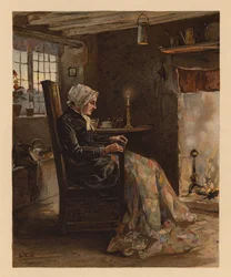 Woman sewing a patchwork quilt