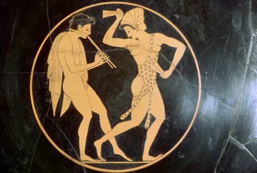 Vase-painting of a youth playing the flute and a woman dancing, 6th century BC