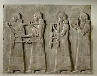 Servants Carrying Hunting Implements