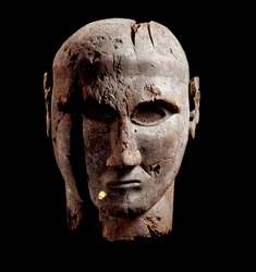 Head of a man, wood sculpture with trace of gold, 7th century BC