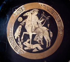 Kylix with representation of Apollon on a mulet, terracotta, 4th century BC