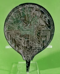 Mirror depicting Aphrodite persuading Helen to follow Paris to Troy, from Palestrina