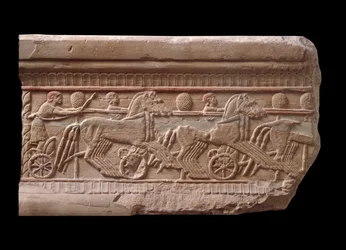 Relief with a chariot race from a marble milestone of Chiusi, Italy, 6th Century BC