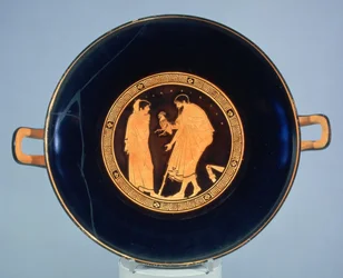 Attic red-figure cup decorated with a man giving a boy a cockerel, c.470 BC