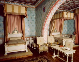 Pink room with furniture by Eugene Viollet le Duc and Edmond Clement-Louis-Marie-Duthoit, Chateau Neuf within Chateau de Roquetaillade, France