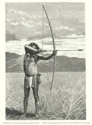 A Veddah of Ceylon shooting with the bow