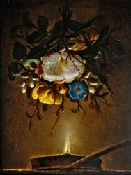 A still life with a bouquet of flowers hanging near a candle